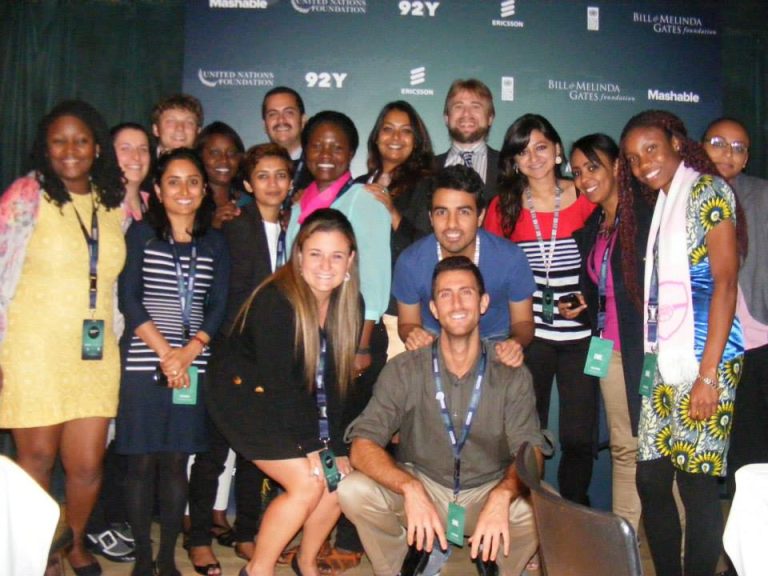 Dave Moss surrounded by Atlas Corps Fellows at the Social Good Summit during UN Week, 2012.